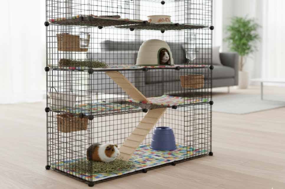 photo of tall stacked guinea pig cage with multiple platforms and ramps